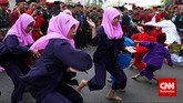 Laga Seribu Pendekar di Jantung Ibu Kota Minggu pagi yang meriah di sekitar kawasan Menteng, Jakarta Pusat, kala digelar Pangsi Betawi yang menampilkan atraksi seribu pendekar silat.