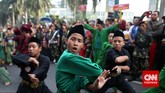 Laga Seribu Pendekar di Jantung Ibu Kota Minggu pagi yang meriah di sekitar kawasan Menteng, Jakarta Pusat, kala digelar Pangsi Betawi yang menampilkan atraksi seribu pendekar silat.