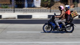 Polisi Ancam Pulangkan Pemudik Motor Bonceng Tiga