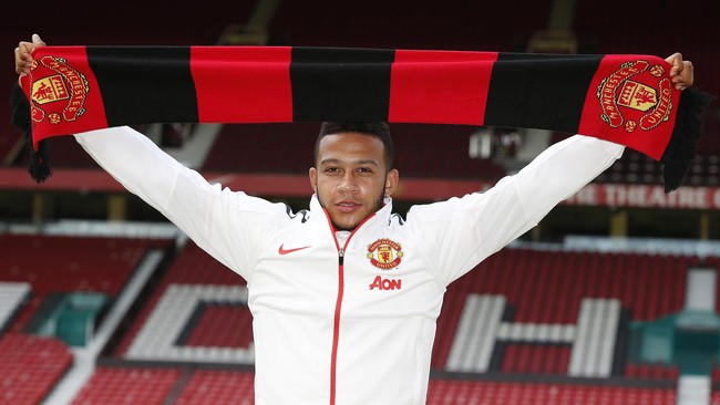 Memphis Depay resmi diperkenalkan sebagai pemain Manchester United dan ia menolak untuk dibandingkan dengan Cristiano Ronaldo.