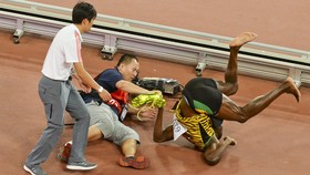 Potret Kronologi Usain Bolt Ditabrak Juru Kamera