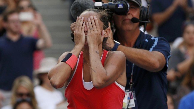 Petenis Italia Roberta Vinci meminta maaf kepada rakyat Amerika Serikat dan publik tenis karena telah menggagalkan impian Serena Williams.
