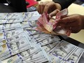 Virus Corona Menggila, Rupiah Amblas ke Rp14.025 per Dolar AS