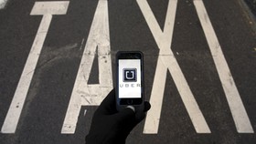 Toyota Investasi Rp7,3 Triliun untuk Uber