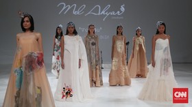 Romantisme Puisi dan Lukisan di Couture Mel Ahyar