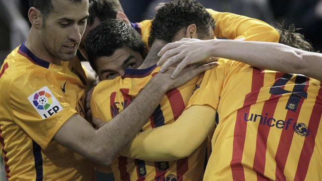 Lionel Messi yang baru kembali dari cedera berhasil memberi Barca kemenangan saat mengalahkan Malaga 2-1 pada lanjutan La Liga di La Rosaleda, Sabtu (23/1).