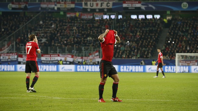 Kemenangan 2-1 PSV Eindhoven dan kekalahan Manchester United dari Wolfsburg membuat Setan Merah terjerembab ke Liga Eropa.