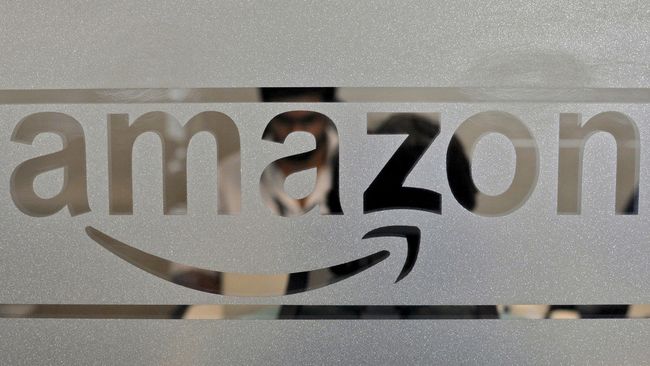 Amazon Uji Coba Robot Pengantar Barang Amazon mulai mengembangkan penggunaan robotik untuk mengatasi masalah logistik.