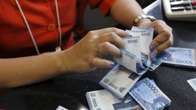 Perkuat Rupiah, Jokowi Pangkas Pajak Deposito dari DHE