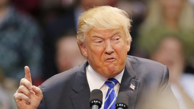 Donald Trump tetap mempertahankan argumennya untuk melarang masuknya umat Muslim ke AS dalam acara debat kandidat calon presiden dari Partai Republik.