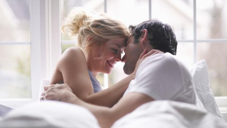 romantic couple embracing  at sunset