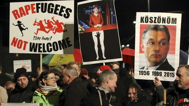 Sebanyak 200 demonstran pendukung sayap kanan mengenakan topeng dan merusak bangunan di kota Leipzig, Jerman timur.