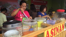 Kisah Pebisnis Asinan Dongkrak Omzet Berkat GrabExpress