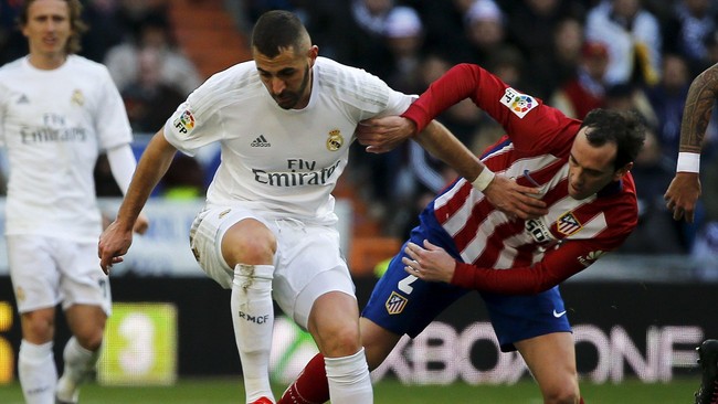 Atletico Madrid sukses mengemas kemenangan La Liga Spanyol di tiga musim beruntun atas Real Madrid di Santiago Bernabeu.