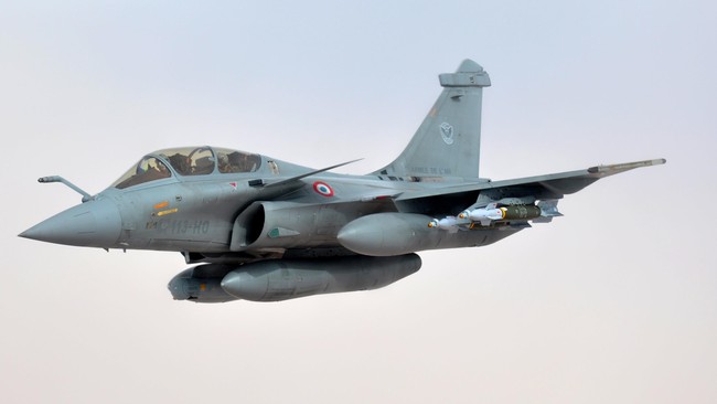 A French fighter aircraft backs away after refueling from a KC-135 Stratotanker March 17, 2013, over Africa. The 351st Expeditionary Air Refueling Squadron, which flies the tankers, completed the 100th refueling mission of French fighter aircraft conducting operations over Mali. Airmen and aircraft from the 100th Air Refueling Wing, RAF Mildenhall, England, deployed as the 351st EARS to a location in southwest Europe on Jan. 26, 2013. (U.S. Air Force photo by Capt. Jason Smith)