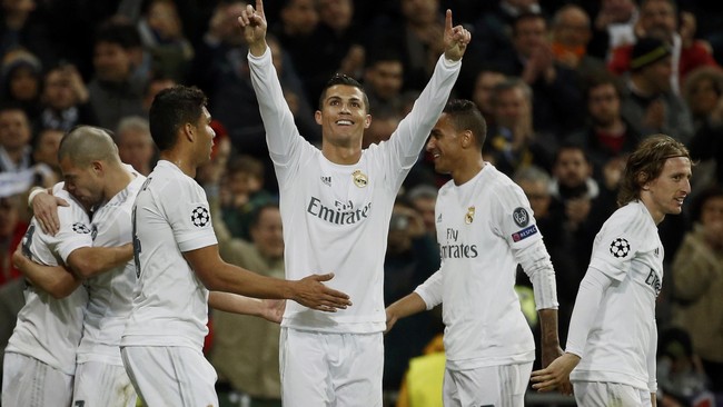 Dua gol dari Ronaldo dan Rodriguez, memastikan Los Blancos lolos dengan agregat empat gol tanpa balas atas AS Roma.
