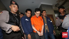 Hartawan Aluwi Dibawa Penyidik Polisi ke Kejagung