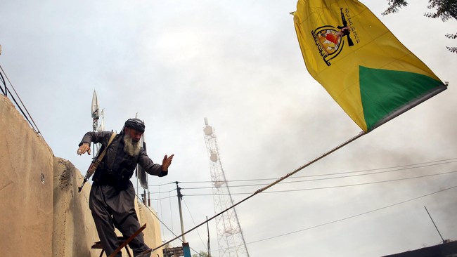 Gencatan senjata yang disepakati sejumlah pemimpin militer di Irak terancam gagal karena bentrokan antara pejuang Kurdi dan kelompok Turkmen Syiah.