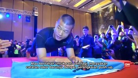 Polisi China Pecahkan Rekor Berbaring Terlama