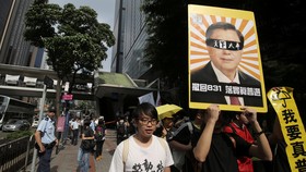 Pejabat China Berkunjung, Warga Hong Kong Gelar Aksi Protes