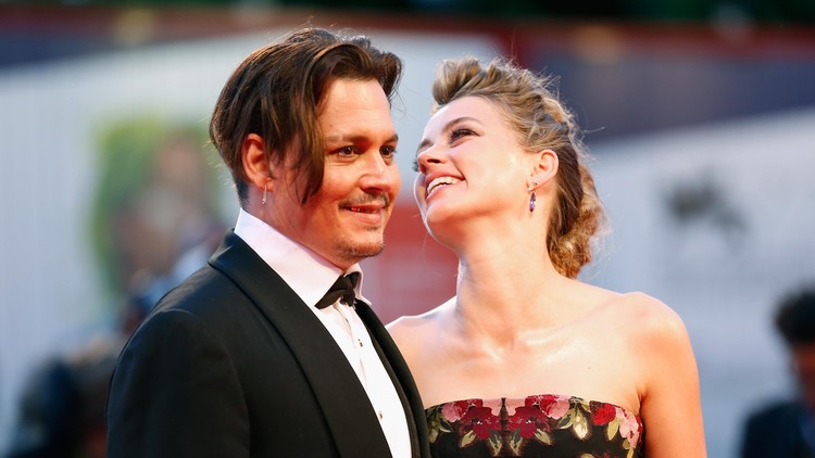 VENICE, ITALY - SEPTEMBER 05:  Johnny Depp and actress Amber Heard attend a premiere for 'The Danish Girl' during the 72nd Venice Film Festival at  on September 5, 2015 in Venice, Italy.  (Photo by Tristan Fewings/Getty Images)
