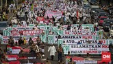 Aksi FPI Kecam PKI Ribuan simpatisan dari beragam organisasi massa Islam menggelar demonstrasi menolak paham komunisme.