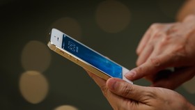Apple Bunuh 'Slide To Unlock' di iOS 10
