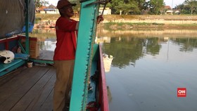 Makna Lebaran Si Penarik Perahu Tambangan