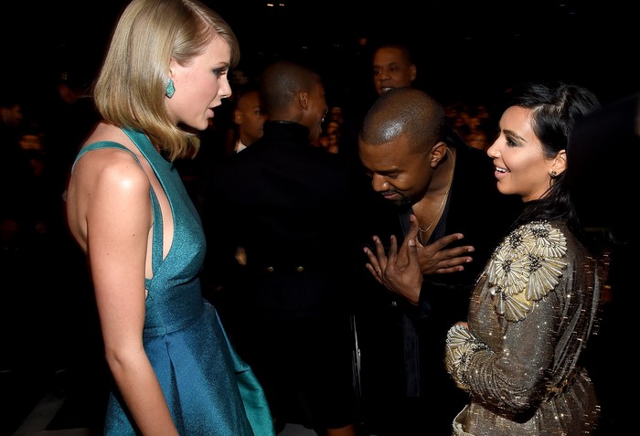 LOS ANGELES, CA - FEBRUARY 08: (L-R) Recording Artists Taylor Swift, Kanye West and tv personality Kim Kardashian attend The 57th Annual GRAMMY Awards at the STAPLES Center on February 8, 2015 in Los Angeles, California. (Photo by Larry Busacca/Getty Images for NARAS) LOS ANGELES, CA - FEBRUARY 08: (L-R) Recording Artists Taylor Swift, Kanye West and tv personality Kim Kardashian attend The 57th Annual GRAMMY Awards at the STAPLES Center on February 8, 2015 in Los Angeles, California. (Photo by Larry Busacca/Getty Images for NARAS)