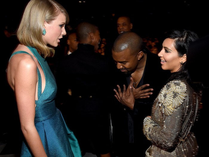 LOS ANGELES, CA - FEBRUARY 08:  (L-R) Recording Artists Taylor Swift, Kanye West and tv personality Kim Kardashian attend The 57th Annual GRAMMY Awards at the STAPLES Center on February 8, 2015 in Los Angeles, California.  (Photo by Larry Busacca/Getty Images for NARAS)
