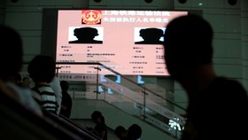 Nama Penunggak Utang Dipajang di Papan Iklan di China
