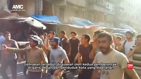 Warga Suriah Merayakan Kemenangan Pemberontak