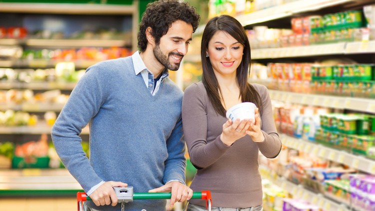 481325926 Couple shopping in a supermarket