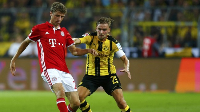 Carlo Ancelotti meraih kemenangan gelar pertamanya bersama Bayern Munich setelah mengalahkan Borussia Dortmund 2-0 pada final Piala Super Jerman.