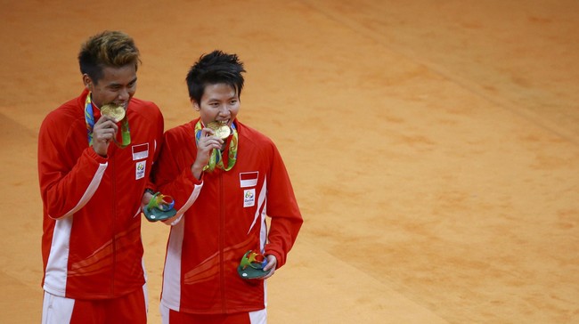 Tontowi Ahmad/Liliyana Natsir menekuk ganda campuran Malaysia dengan skor telak. Namun bukan berarti ganda Indonesia tak menanggung beban berat.