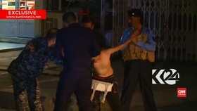 Detik-Detik Polisi Melepas Rompi Bunuh Diri dari Bocah Irak