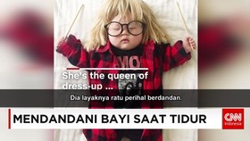 Foto Viral Mendandani Bayi Saat Tidur