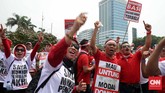 Potret Karyawan Telkom Geruduk DPR Sejumlah karyawan Telkom dan Telkomsel melakukan unjuk rasa di depan Gedung DPR memprotes rencana pemerintah menurunkan tarif interkoneksi seluler.