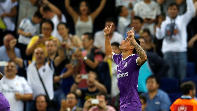 James Rodriguez tak mau kalah dari Lionel Messi. Rodriguez kini bersaing dengan penyerang Barcelona itu dalam urusan membobol gawang dari jarak jauh.