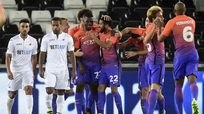 Manchester City mempertahankan rekor 100 persen menang di bawah asuhan Pep Guardiola setelah mengalahkan Swansea City 2-1 pada putaran ketiga Piala Liga.
