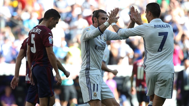 Pelatih timnas Wales, Chris Coleman, yakin Gareth Bale telah sukses membayar kepercayaan Real Madrid dengan dua trofi Liga Champions yang diraih El Real.