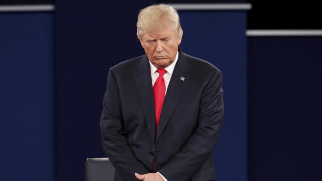 Berkas gugatan Kementerian Kehakiman AS mengindikasikan pemerintah akan terus berupaya mempertahankan larangan imigrasi Trump di pengadilan federal.