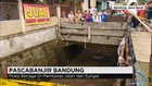 Banjir Hanyutkan Mobil Warga
