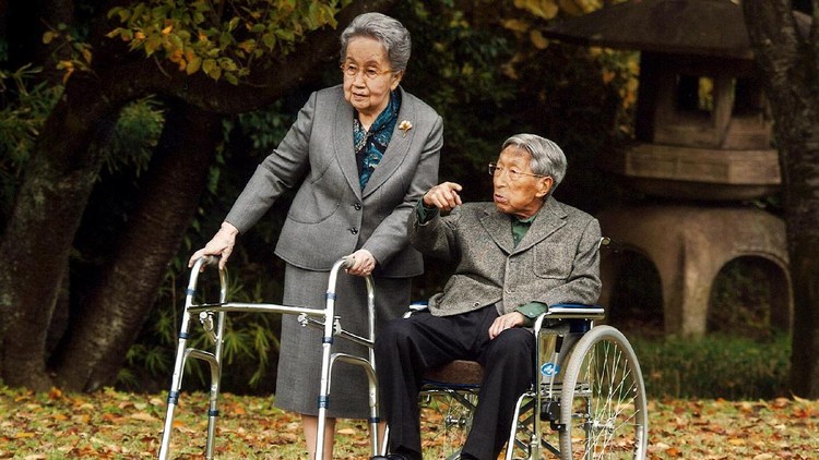 Japanese Prince Mikasa and his wife Princess Yuriko are seen at their residence in Tokyo in this handout file photo taken by Imperial Household Agency on November 16, 2015. Prince Mikasa, the youngest brother of late wartime Emperor Hirohito and the country's longest-living royal in modern times, celebrated his 100th birthday on December 2, 2015. Prince Mikasa, uncle of Emperor Akihito, died on Thursday, Kyodo reported.  REUTERS/Imperial Household Agency of Japan/Handout via Reuters/File Photo      ATTENTION EDITORS - THIS IMAGE WAS PROVIDED BY A THIRD PARTY. FOR EDITORIAL USE ONLY.