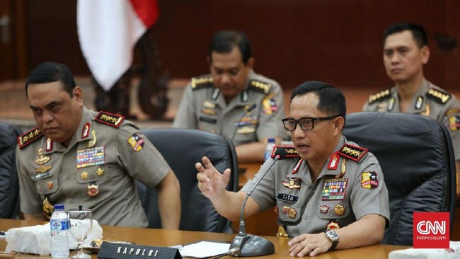 Ratusan ribuan orang yang turun ke jalan pada 4 November tidak membuat Polri tertekan saat menetapkan status hukum Ahok.