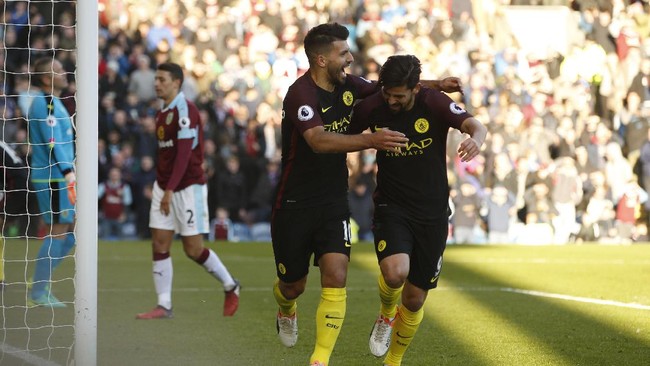 Pep Guardiola mengaku puas dengan mental bertanding yang ditunjukkan Manchester City ketika mengalahkan Burnley 2-1 di Turf Moor.