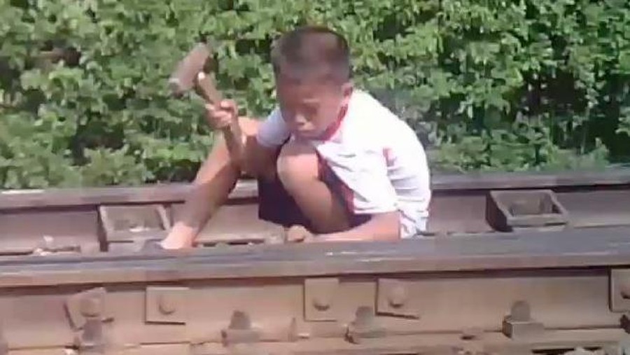 Footage shows children being forced to do hard labour in North Korea. Picture: Mirrorpix