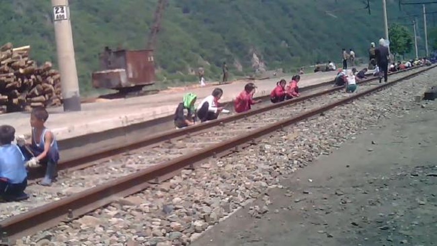 Footage obtained by the Mirror shows children being forced to do hard labour in North Korea. Picture: Mirrorpix Source:Supplied