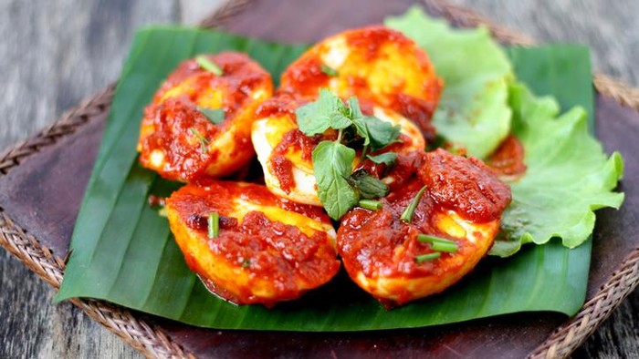 Sambal Telur - Malay traditional cuisine. Hard boiled eggs and chilli sauce