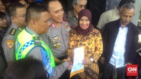 Sepakat Berdamai, Sutisna Cabut Laporan Pencakaran Dora